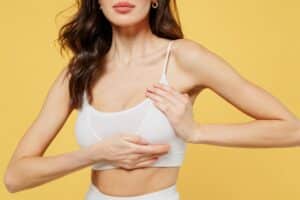 Beautiful woman lifts one of her breasts up in Boca Raton, FL