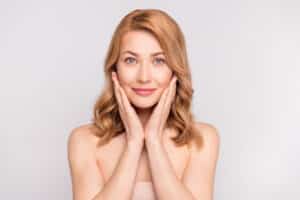 beautiful mature woman with smooth skin from neuromodulators and dermal fillers